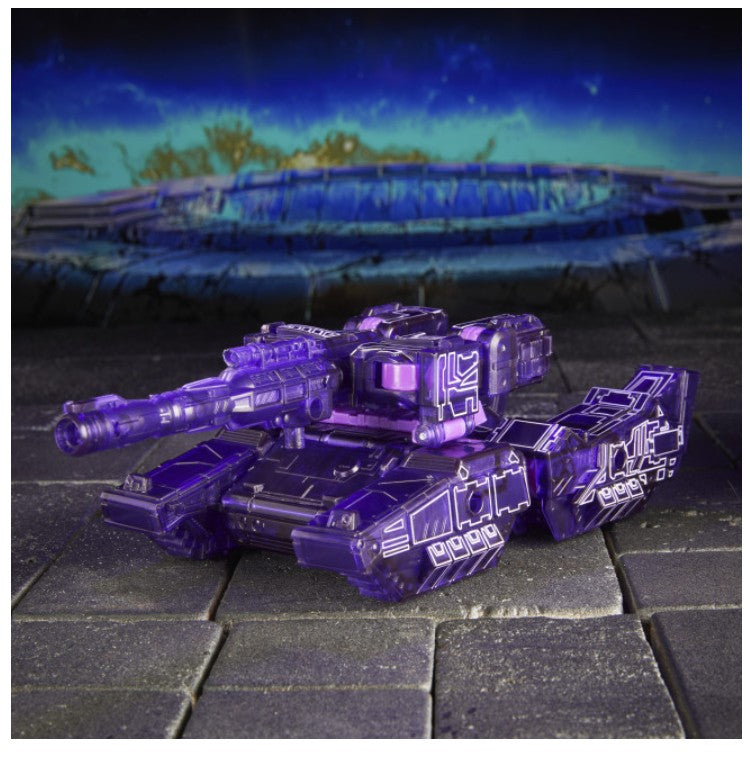 Transformers Prime Series 18 Megatron in tank form on a gray stone surface with a dark blue and green sci-fi landscape backdrop.