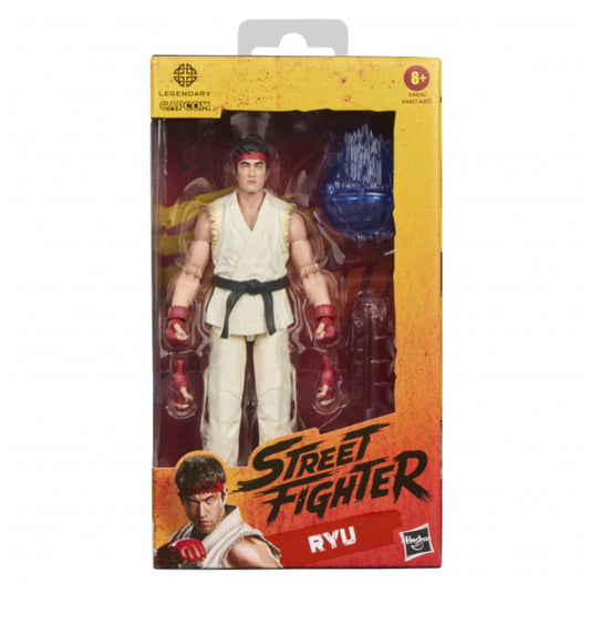Hasbro Street Fighter Collection Ryu action figure in its original window box packaging, featuring a yellow and orange design with character artwork.